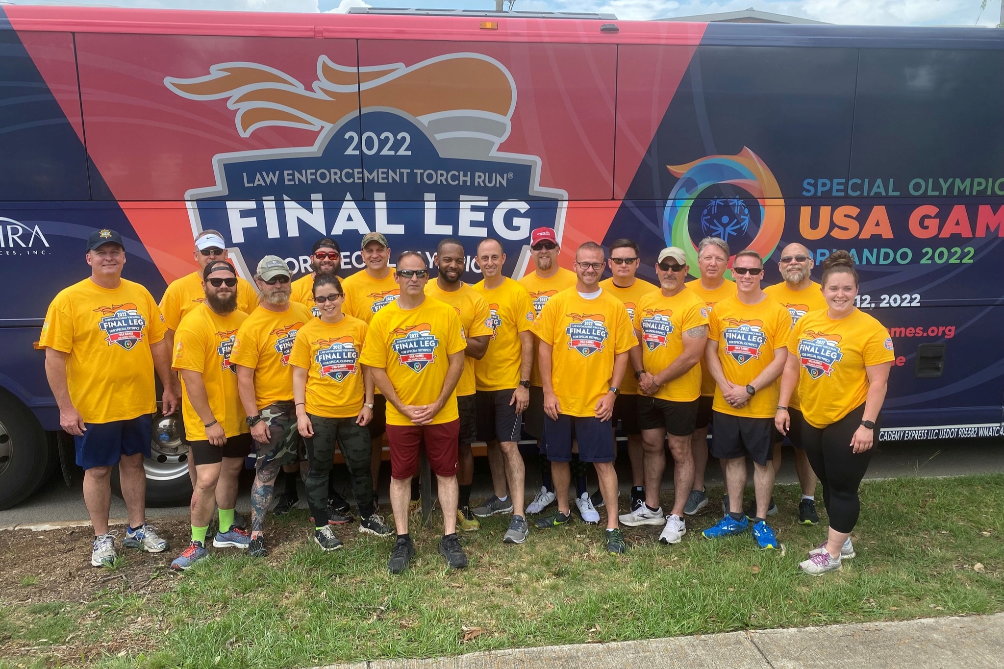 sheriff and deputies pose for picture after torch run